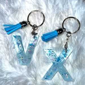 V X Keychains